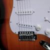 yz)      Encore Blaster electric guitar in sunburst