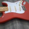 B) fender stratocaster - mexican - fiesta red