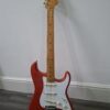 B) fender stratocaster - mexican - fiesta red